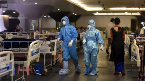 Medical staff attend to patients in the Shehnai Banquet Hall Covid-19 care centre on April 15 in New Delhi.