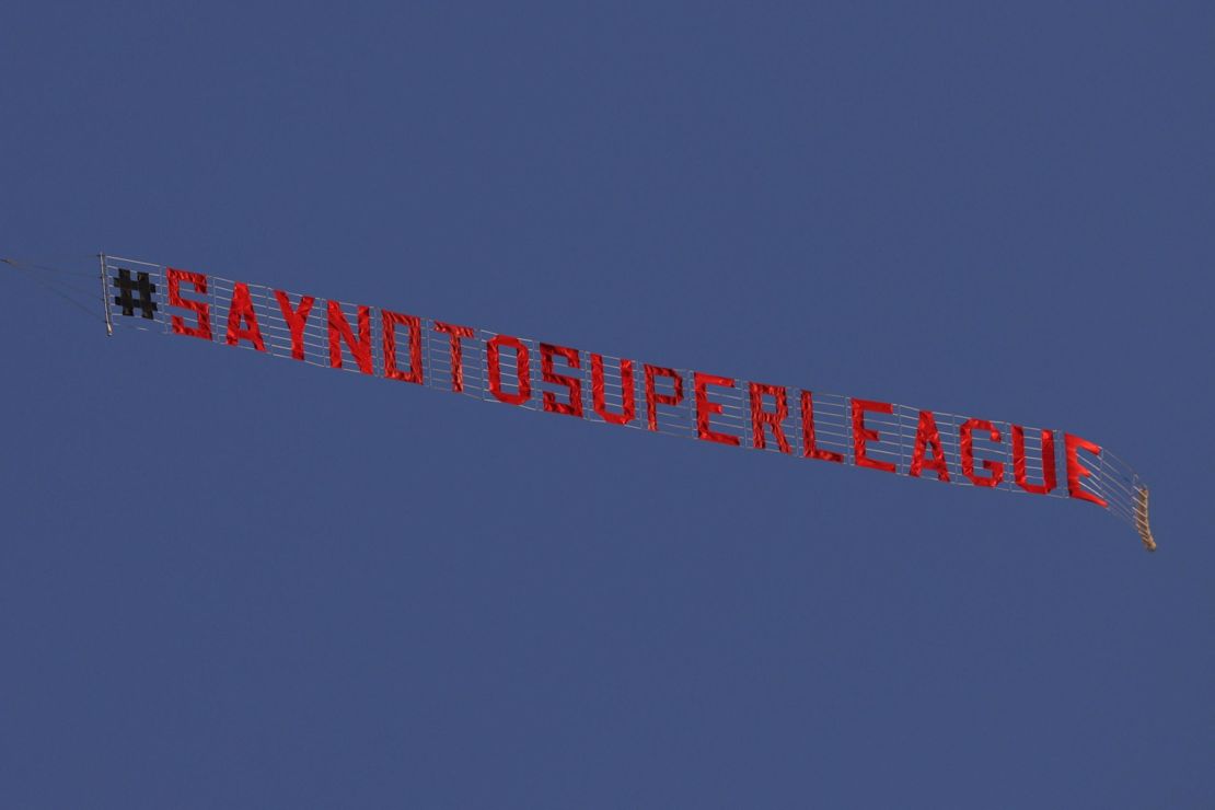 A plane flies over Elland Road in protest against the European Super League.