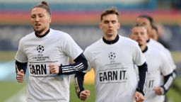 LEEDS, ENGLAND - APRIL 19: Luke Ayling of Leeds United warms up while wearing a protest t-shirt against the European Super League prior to the Premier League match between Leeds United and Liverpool at Elland Road on April 19, 2021 in Leeds, England. Sporting stadiums around the UK remain under strict restrictions due to the Coronavirus Pandemic as Government social distancing laws prohibit fans inside venues resulting in games being played behind closed doors.  (Photo by Clive Brunskill/Getty Images)