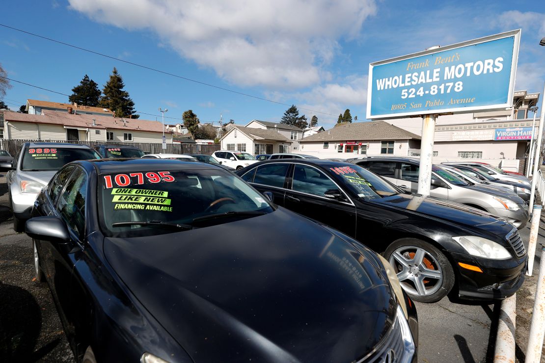 Used cars sit on the sales lot in El Cerrito, California. 