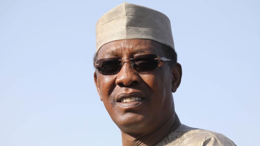 Chad's president Idriss Deby welcomes France's president upon his arrival at the international airport of N'Djamena on December 22, 2018. - French president is on visit to meet with Chadian president and with soldiers from the Barkhane mission in Africa's Sahel region. (Photo by Ludovic MARIN / AFP)        (Photo credit should read LUDOVIC MARIN/AFP via Getty Images)
