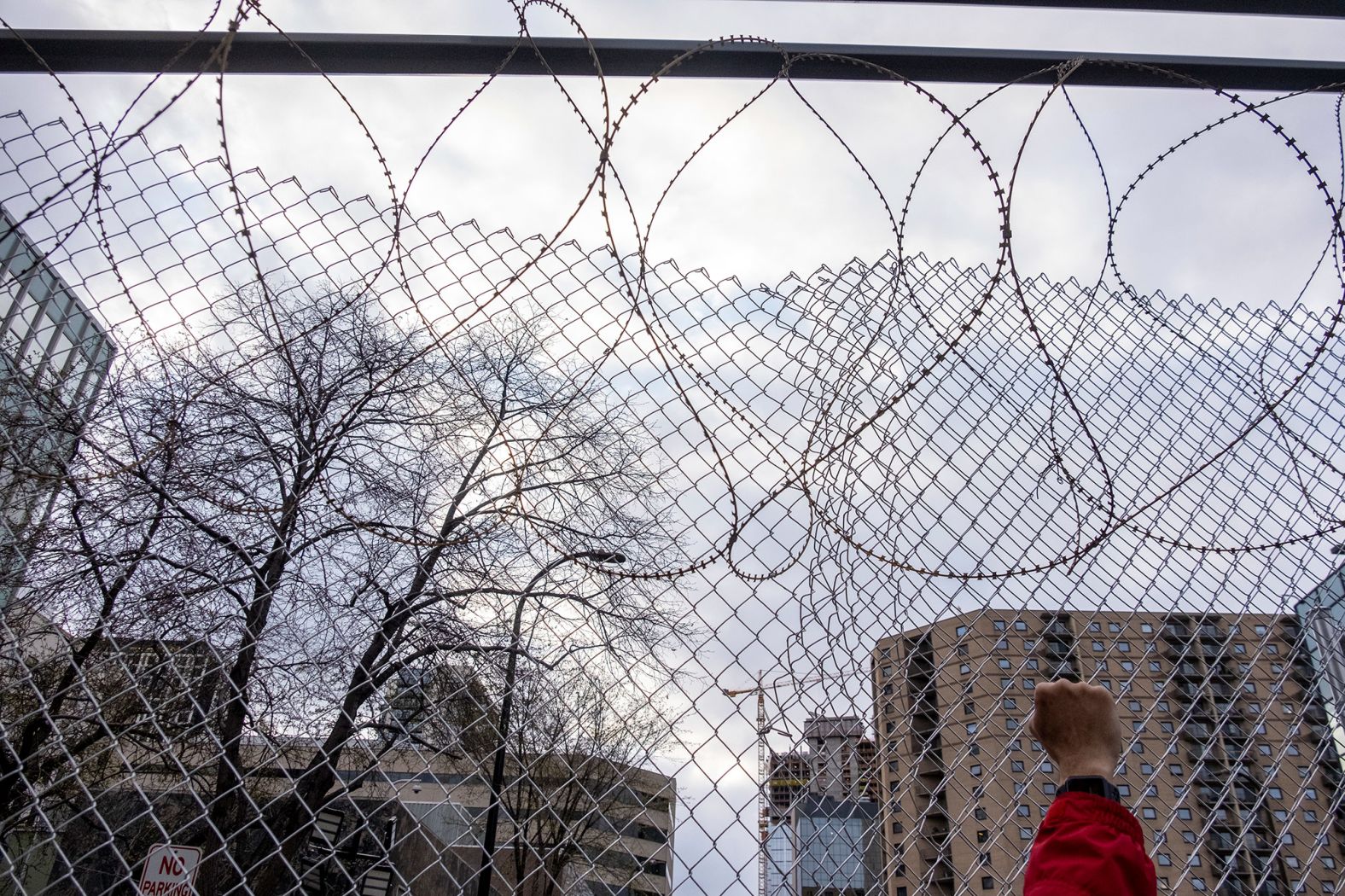 A demonstrator raises a fist outside a police station in Minneapolis.