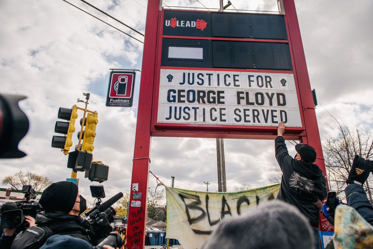People in Minneapolis celebrate the guilty verdict at the intersection of 38th Street & Chicago Avenue -- the site where George Floyd died in May 2020.