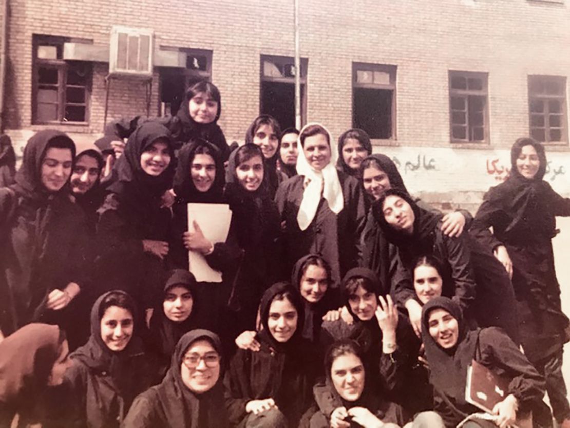 Young Roya Hakakian pictured with peers in Iran. Hakakian, now 54, fled Iran following a rise in anti-Semitism in the country.