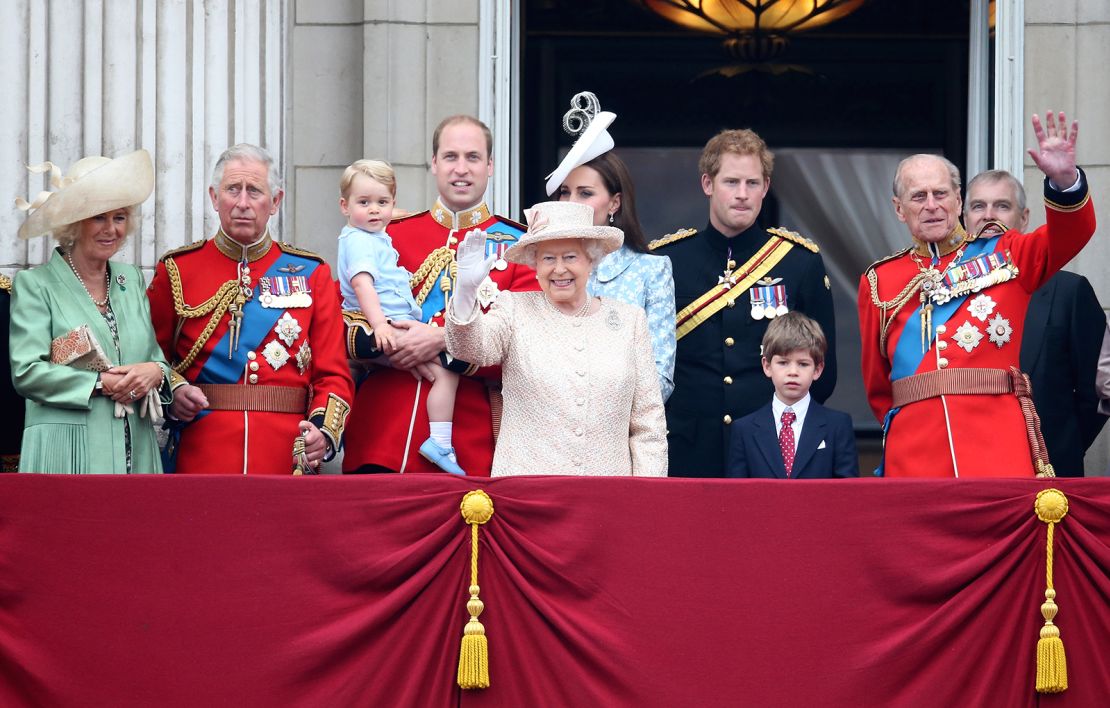 The Queen, Prince Philip and members of the royal family watch the fly-past from the balcony of Buckingham Palace following the Trooping The Colour ceremony on June 13, 2015.