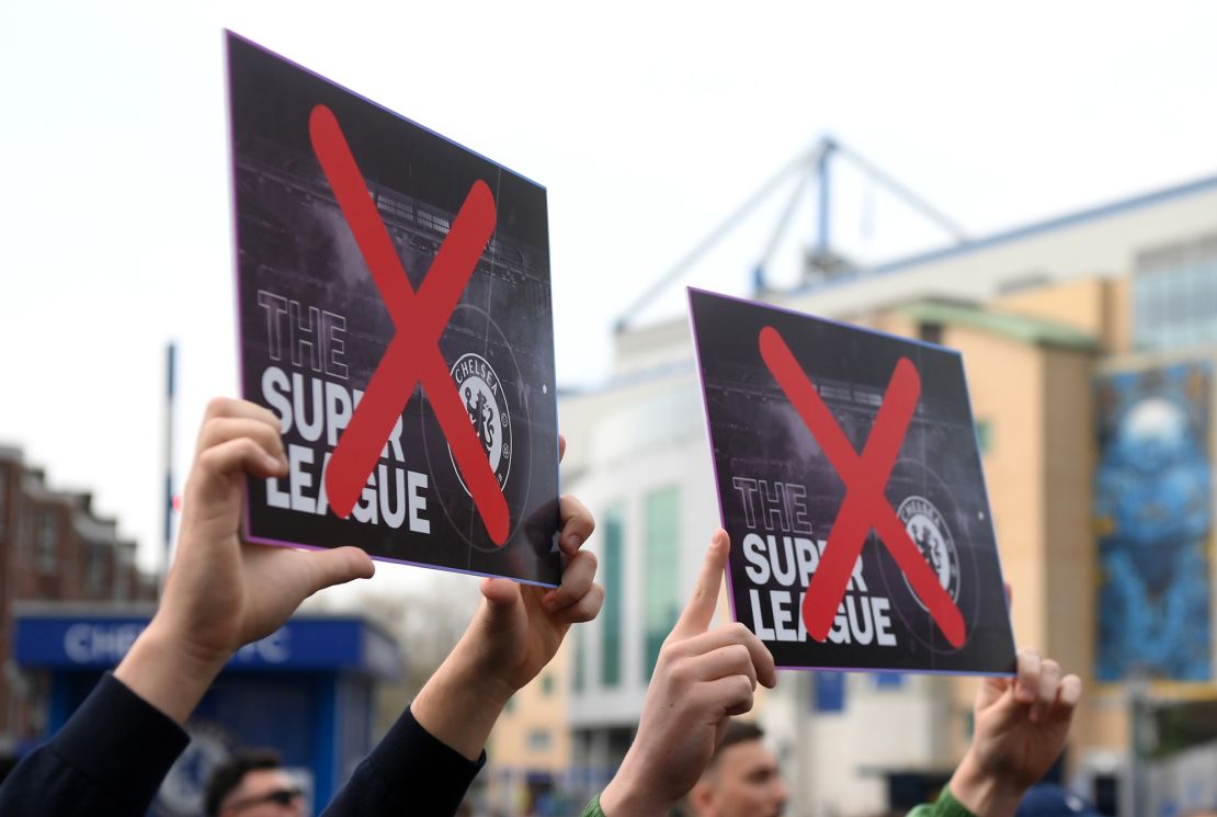 Chelsea fans protest against the proposed European Super League prior to the Premier League match between Chelsea and Brighton & Hove Albion at Stamford Bridge on April 20, 2021.