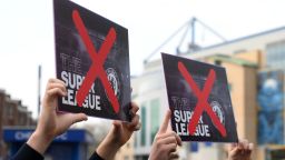 Chelsea fans protest against the newly proposed European Super League prior to the Premier League match between Chelsea and Brighton & Hove Albion at Stamford Bridge on April 20, 2021 in London, England. Sporting stadiums around the UK remain under strict restrictions due to the Coronavirus Pandemic as Government social distancing laws prohibit fans inside venues resulting in games being played behind closed doors. (Photo by Mike Hewitt/Getty Images)