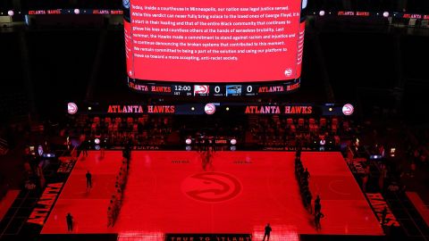 The Atlanta Hawks and Orlando Magic observe the guilty verdicts in the Derek Chauvin trial prior to a game at State Farm Arena on April 20, 2021 in downtown Atlanta.