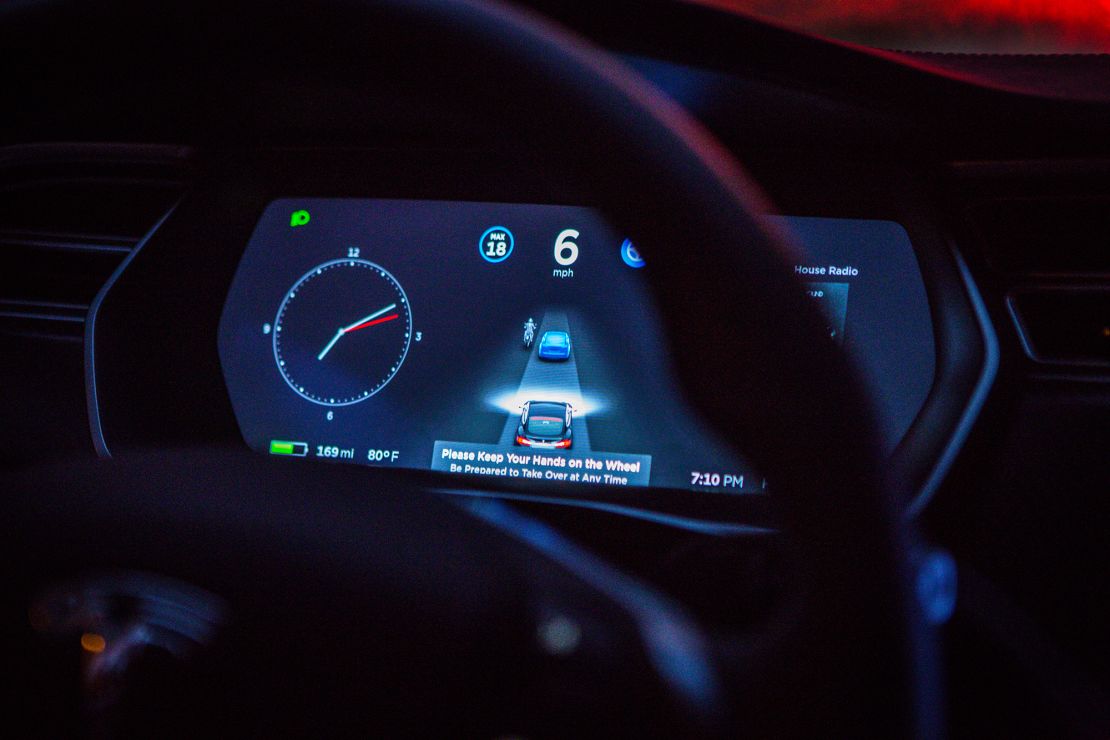 An instrument panel with the Tesla Motors Inc. 8.0 software update illustrates the road ahead using radar technology inside a Model S P90D vehicle in the Brooklyn borough of New York, U.S., on Tuesday, Sept. 20, 2016. 