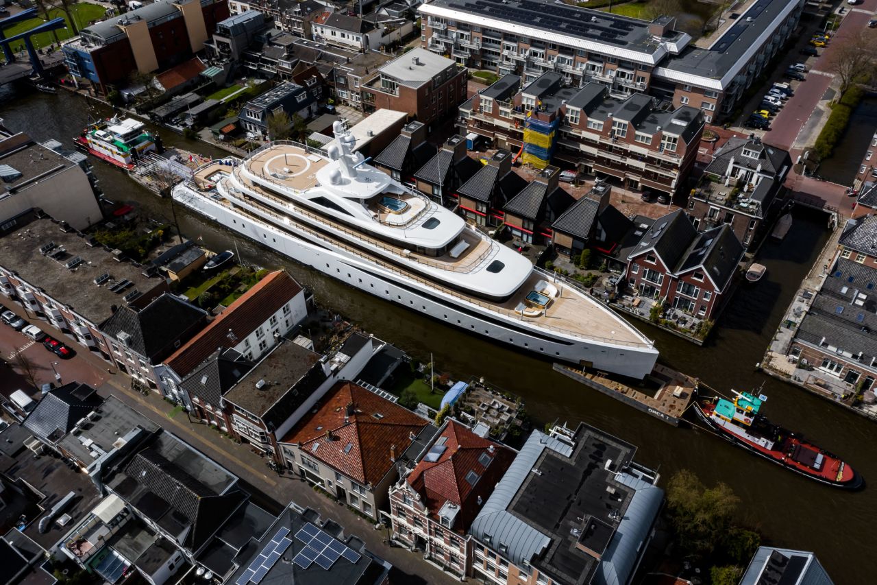Feadship's new superyacht Project 817 is guilded through the canals of Holland while en route to the North Sea.