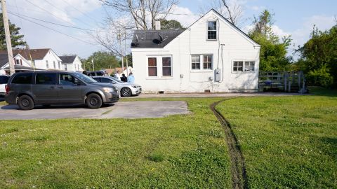 A neighbor said mud from a spinning tire splattered on this home.