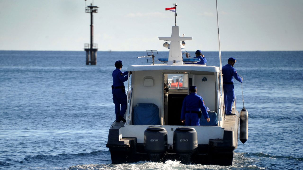 Indonesian marine police take part in the search operation for the missing naval KRI Nanggala-402 submarine on Thursday. 