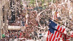 Thousands of Gulf War veterans are showered with ticker-tape as they march up Broadway Avenue during the Operation Welcome Home parade during the 10 June 1991 celebration for returning Gulf War troops.  AFP PHOTO TIM CLARY        (Photo credit should read TIMOTHY A. CLARY/AFP via Getty Images)