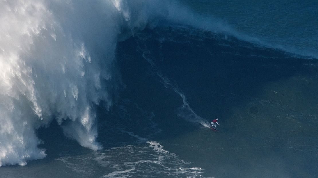 Gabeira drops into a wave at Praia do Norte, Portugal, on January 18, 2018.