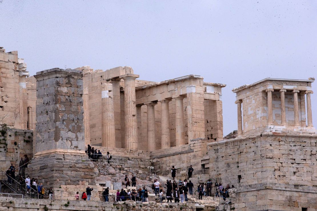 People visit the Acropolis in Athens, Greece, on April 18. Archaeological sites were opened to the public for the International Day for Monuments and Sites.
