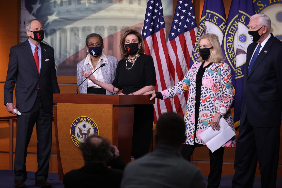 From left to right, Sen. Tom Carper of Delaware, Del. Eleanor Norton Holmes, House Speaker Nancy Pelosi, Rep. Carolyn Maloney and House Majority Leader Steny Hoyer hold a news conference about statehood for the District of Columbia at the US Capitol on Thursday in Washington, DC.  
