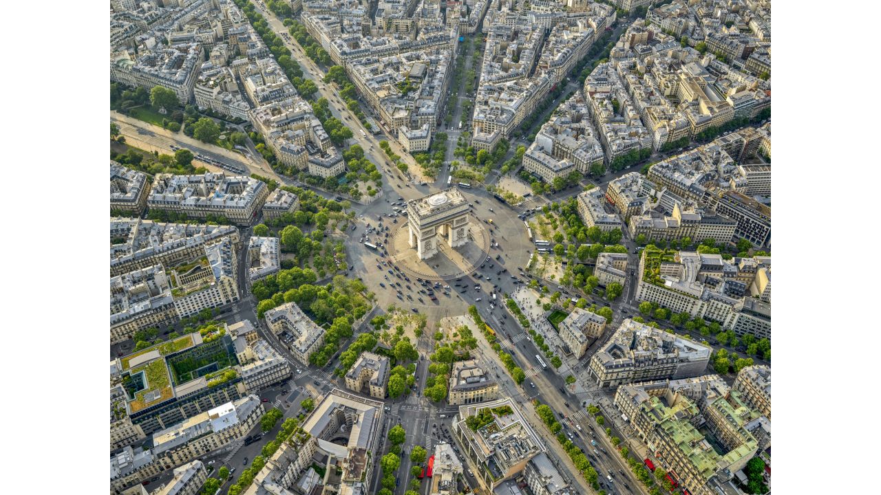 <strong>Arc de Triomphe: </strong>The book also features angled shots of the city's neighborhoods and famous monuments, including the Arc de Triomphe.
