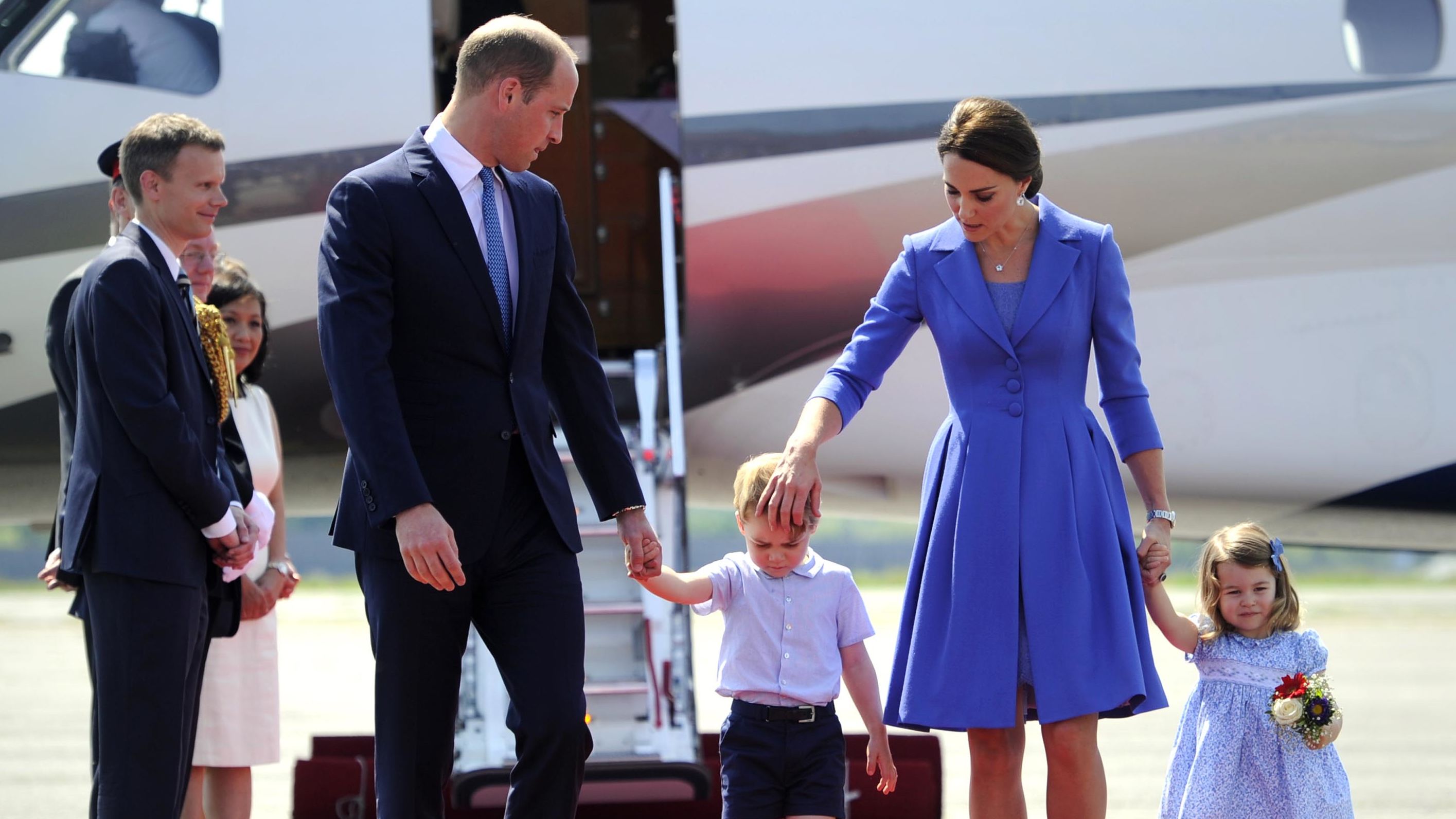 The royal family arrives at the airport in Berlin for a three-day visit in Germany in July 2017.