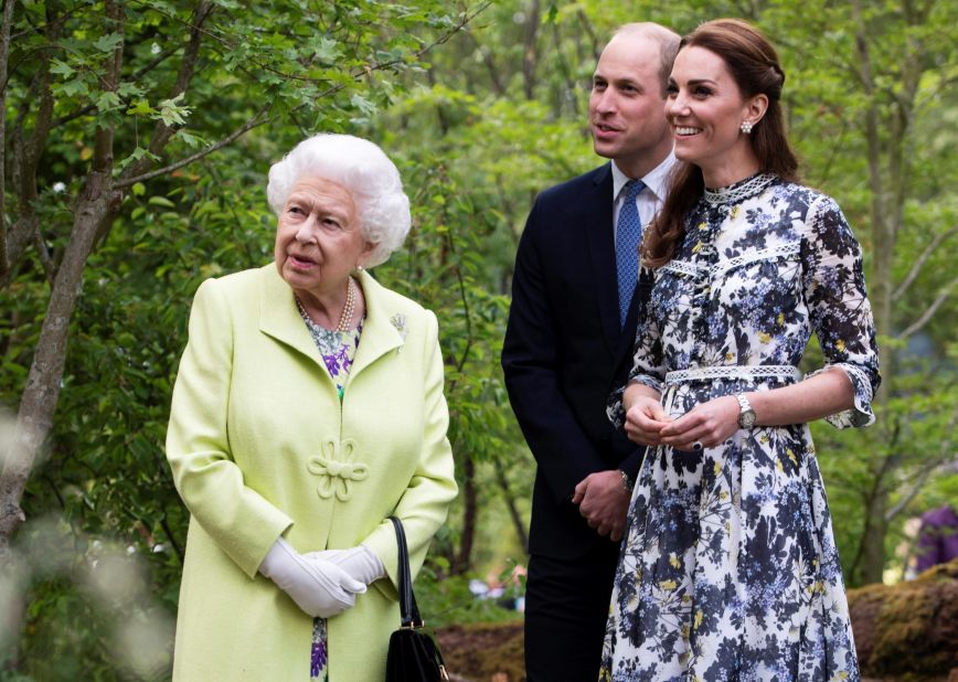 Catherine shows William and Queen Elizabeth II around the "Back to Nature Garden" that she helped designed as they visit the Chelsea Flower Show in London in May 2019.