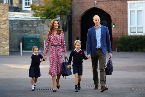 William and Kate escort Princess Charlotte, accompanied by her brother, Prince George, as Charlotte arrives for <a href=