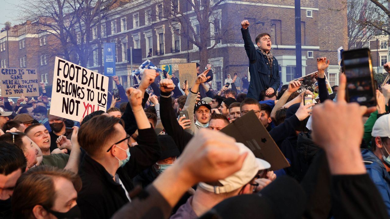 Chelsea fans protest against the proposed European Super League outside of Stamford Bridge.
