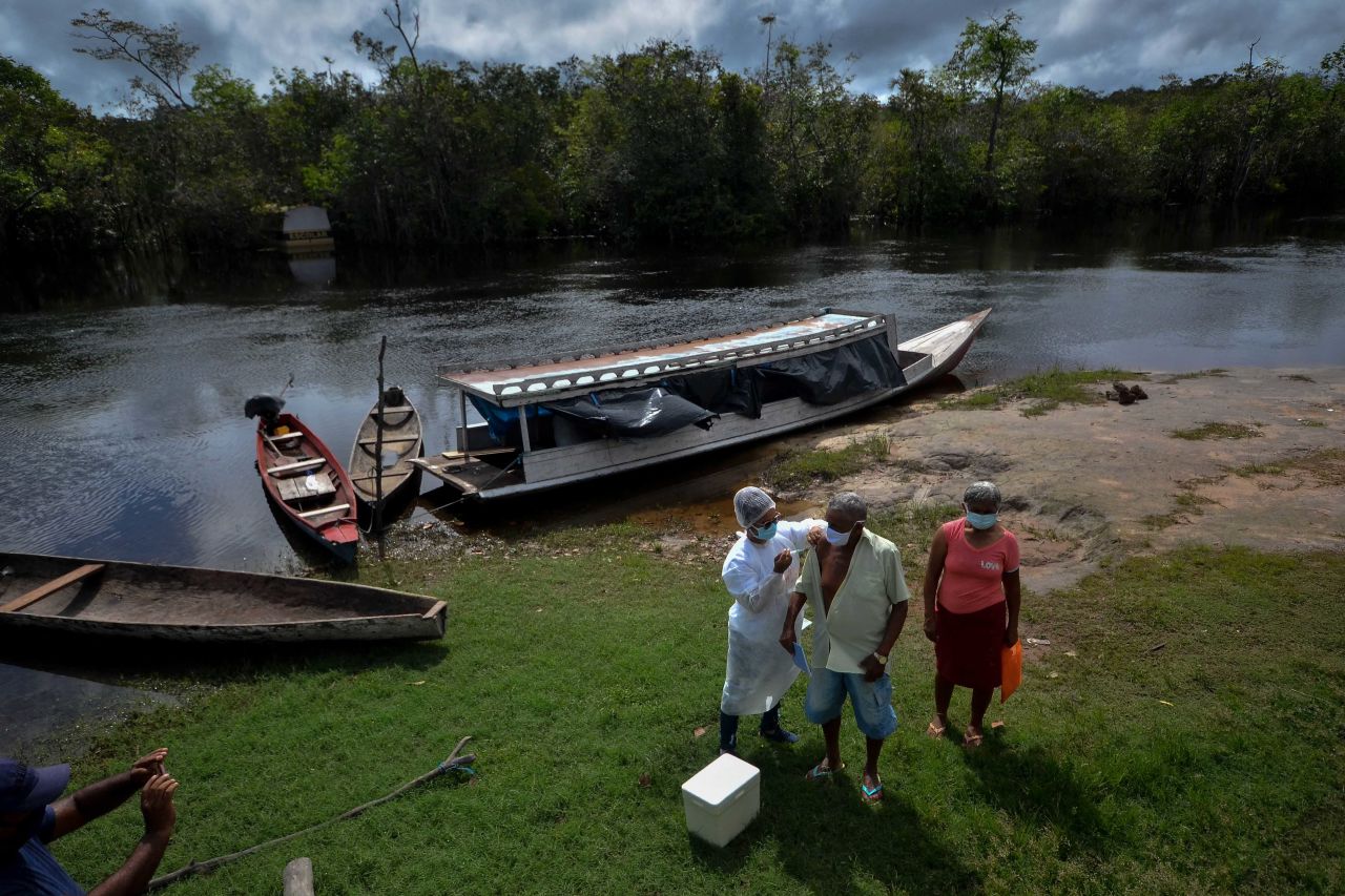 A health worker administers a dose of the Oxford-AstraZeneca Covid-19 vaccine in Para State, Brazil, on April 17.