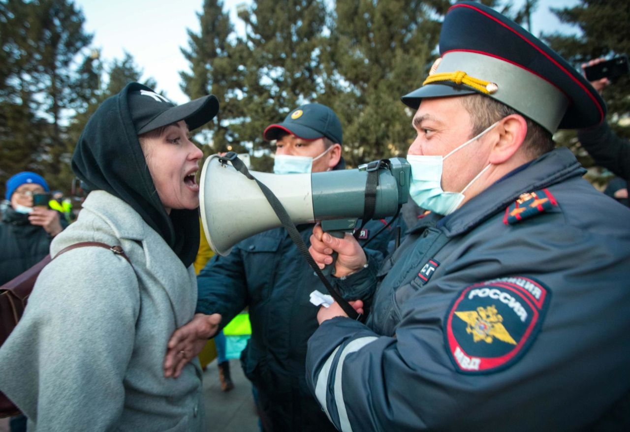 A woman argues with police during a protest in support of jailed opposition leader Alexei Navalny in Ulan-Ude, Russia, on Wednesday, April 21. <a href="https://www.cnn.com/2021/04/21/europe/russia-putin-address-navalny-protests-intl/index.html" target="_blank">Thousands of people in cities across the country rallied</a> for Navalny's release.