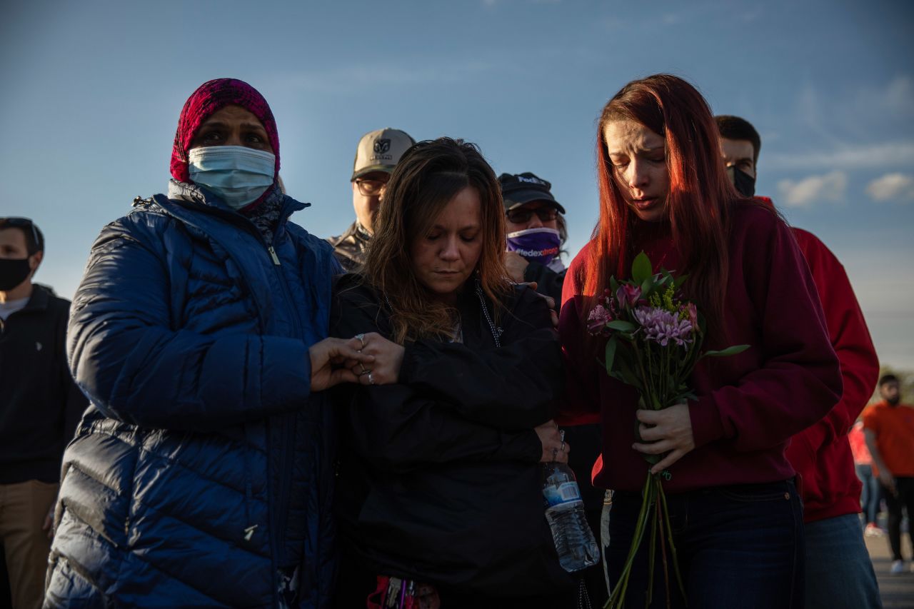 Mourners hold a vigil outside a FedEx facility in Indianapolis, Indiana, on April 17. A former employee <a href="https://www.cnn.com/2021/04/16/us/indianapolis-shooting-fedex-facility/index.html" target="_blank">shot and killed eight people</a> and wounded several others at the facility on April 15. 