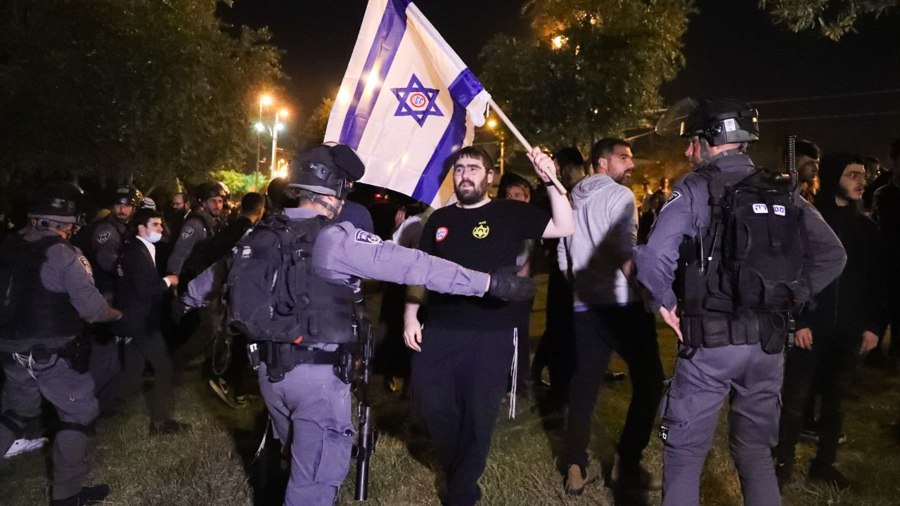 Israeli border police block members of Lehava, a Jewish extremist group, near Damascus Gate amid heightened tensions in the city.