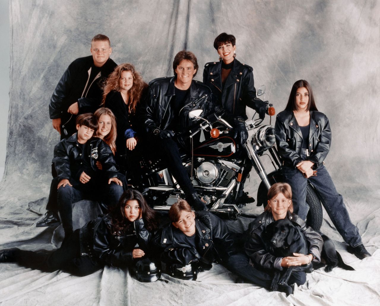 The Jenner-Kardashian family poses for a portrait in 1993. Kris and Jenner each had four children when they were married. Clockwise from top left, the kids are Burton Jenner, Khloe Kardashian, Kim Kardashian, Brandon Jenner, Brody Jenner, Kourtney Kardashian, Cassandra Jenner and Rob Kardashian.
