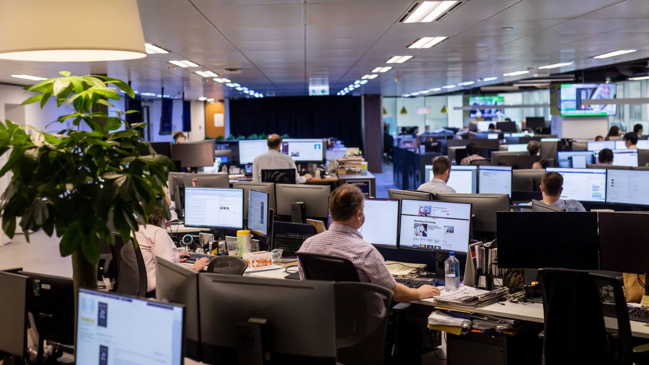 Employees work in the newsroom of the South China Morning Post (SCMP) in Hong Kong, on June 5, 2020. 
