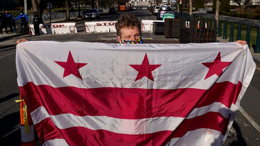 WASHINGTON, DC - MARCH 22: Residents of the District of Columbia rally for statehood near the U.S. Capitol on March 22, 2021 in Washington, DC. On Monday, the House Oversight Committee is holding a hearing on legislation that the House passed last Summer that would establish the District of Columbia as the 51st state. The District has a population of nearly 700,000 residents. (Photo by Drew Angerer/Getty Images)