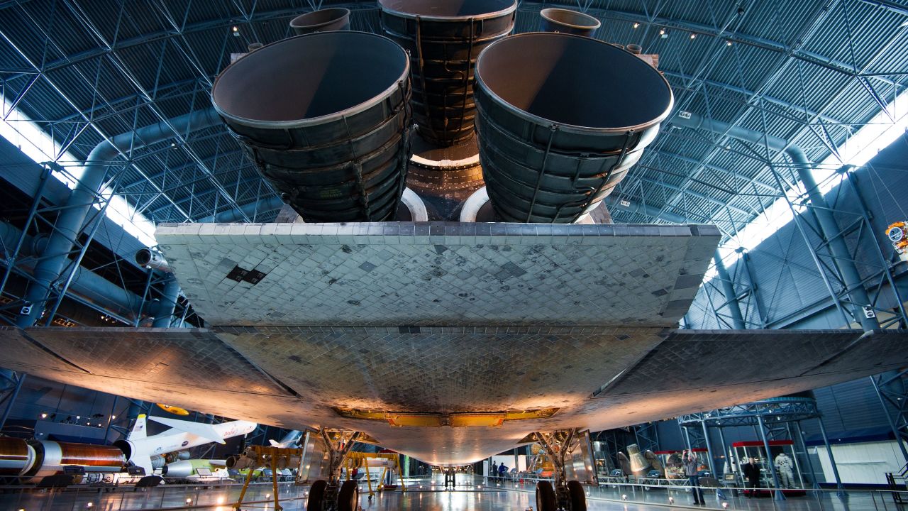 The rear of the Space Shuttle Discovery is seen on display at the Smithsonican National Air and Space Museum Steven F. Udvar-Hazy center outside of Washington, DC, in Chantilly, Virginia, January 23, 2014, on the edge of Dulles Airport.      AFP PHOTO/Paul J. Richards        (Photo credit should read PAUL J. RICHARDS/AFP via Getty Images)