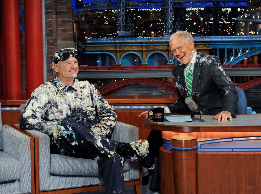 Bill Murray jumps out of a cake during his final appearance on the "Late Show with David Letterman" in 2015.