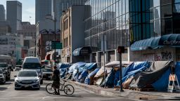 Los Angeles, CA, Tuesday, April 20, 2021 - Tents lined up on 4th St. on Skid Row, downtown. (Robert Gauthier/Los Angeles Times via Getty Images)