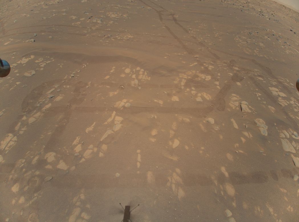 This photo of the Martian surface was captured by the Ingenuity helicopter during <a href="https://www.cnn.com/2021/04/22/world/mars-helicopter-second-flight-scn-trnd/index.html" target="_blank">its second flight on the Red Planet</a> on Thursday, April 22. Mars has one-third of the gravity we experience on Earth, and the atmosphere is 1% of the density of Earth's at its surface. This makes controlled flight much more difficult there.