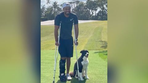 Tiger Woods on crutches in the first photo he's posted online of himself since February's car accident.