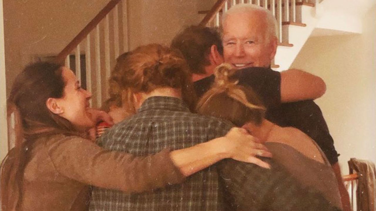 Then-President-elect Joe Biden is embraced by family in this photo posted on Twitter by his granddaughter, Naomi Biden, on November 7, 2020.