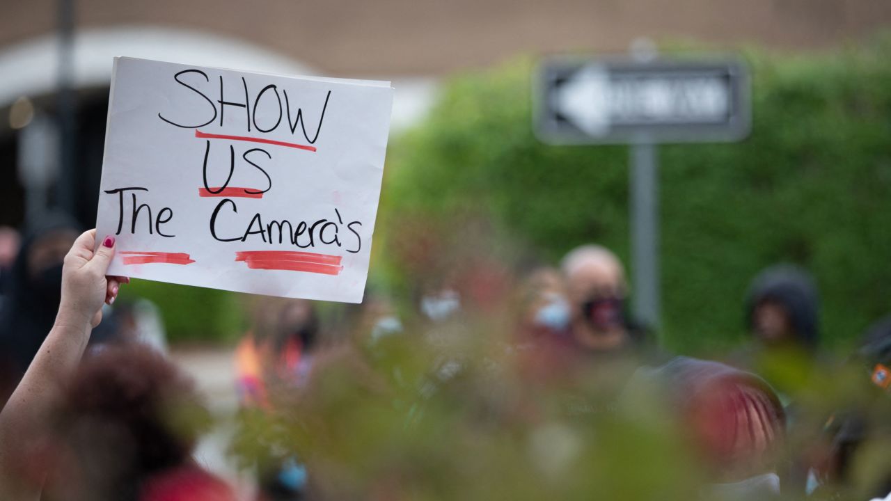 Protesters rally in front of the city municipal building in Elizabeth City, North Carolina, on Friday.