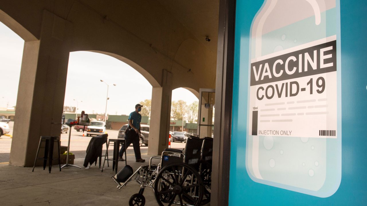 A person walks to the former Stein Mart store on Washington Road in Augusta, Georgia, on March 25, 2021, for Augusta University's Covid-19 vaccination clinic.