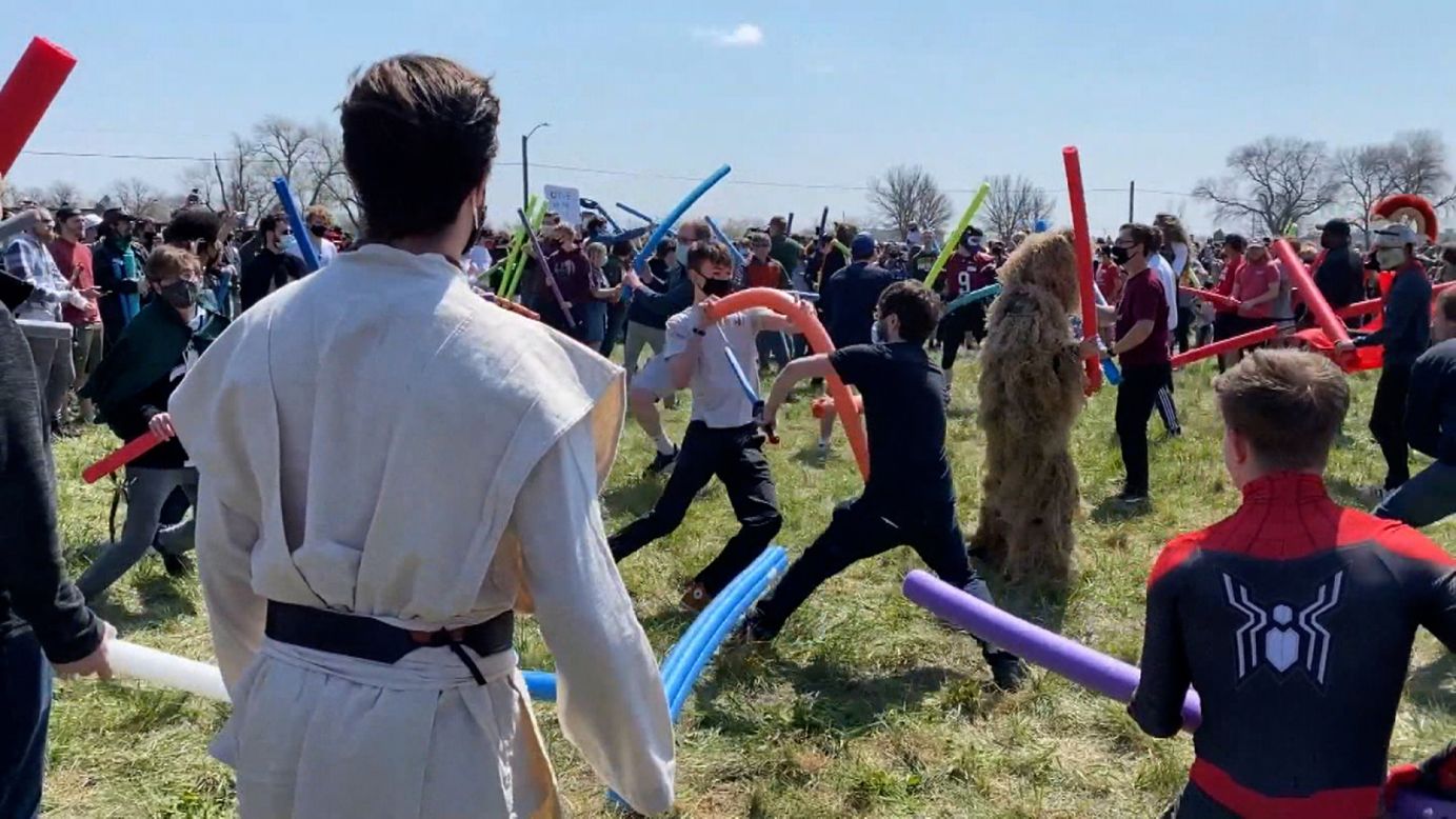 Hundreds of people named Josh, from all around the United States, use pool noodles as they playfully fight over their shared name Saturday, April 24, in Lincoln, Nebraska. <a href="https://www.cnn.com/2021/04/25/us/little-josh-josh-fight-winner-trnd/index.html" target="_blank">The challenge</a> was first issued on social media last year.