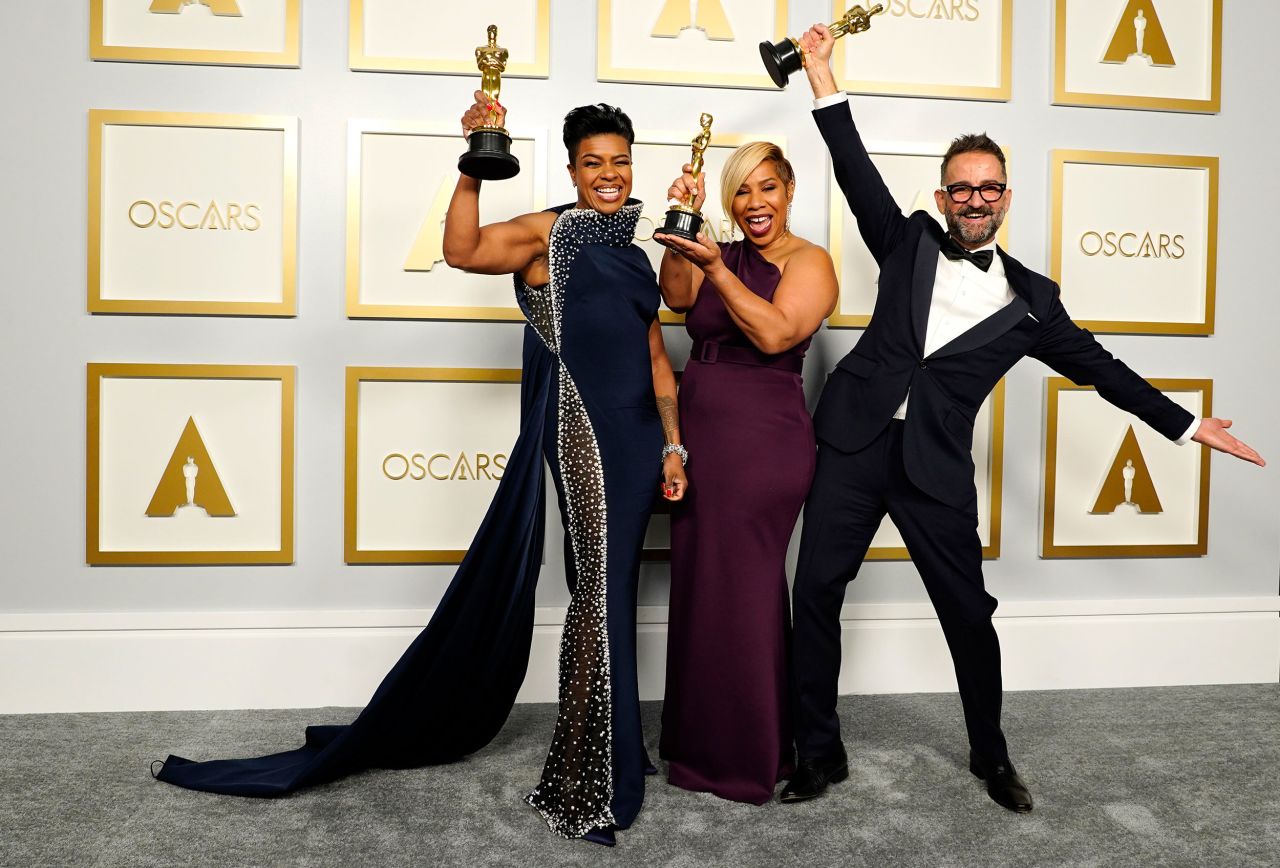 From left, Mia Neal, Jamika Wilson and Sergio Lopez-Rivera pose with the Oscars they won for best makeup and hairstyling ("Ma Rainey's Black Bottom").
