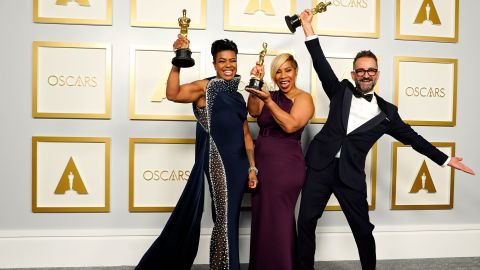 From left, Mia Neal, Jamika Wilson and Sergio Lopez-Rivera pose with the Oscars they won for best makeup and hairstyling ("Ma Rainey's Black Bottom").