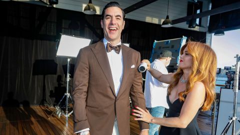 Actor Sacha Baron Cohen is cleaned up by his wife, Isla Fisher. They appeared on the show from Sydney.