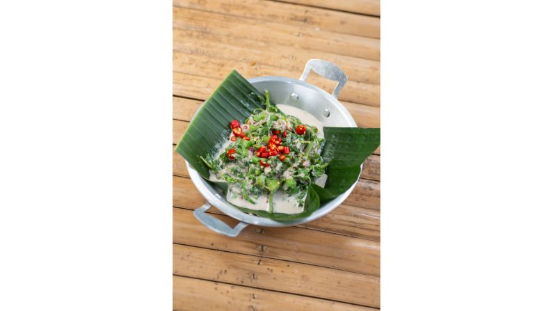 <strong>Pattani: </strong>Kerabu is a Malay-style salad with vegetable ferns and long beans. This version was served at a restaurant in Pattani, one of Thailand's southernmost provinces. 
