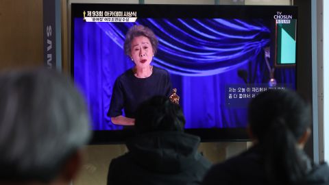 People watch Youn's acceptance speech from a railway station in Seoul, South Korea. She's the first South Korean actress to win an Oscar.