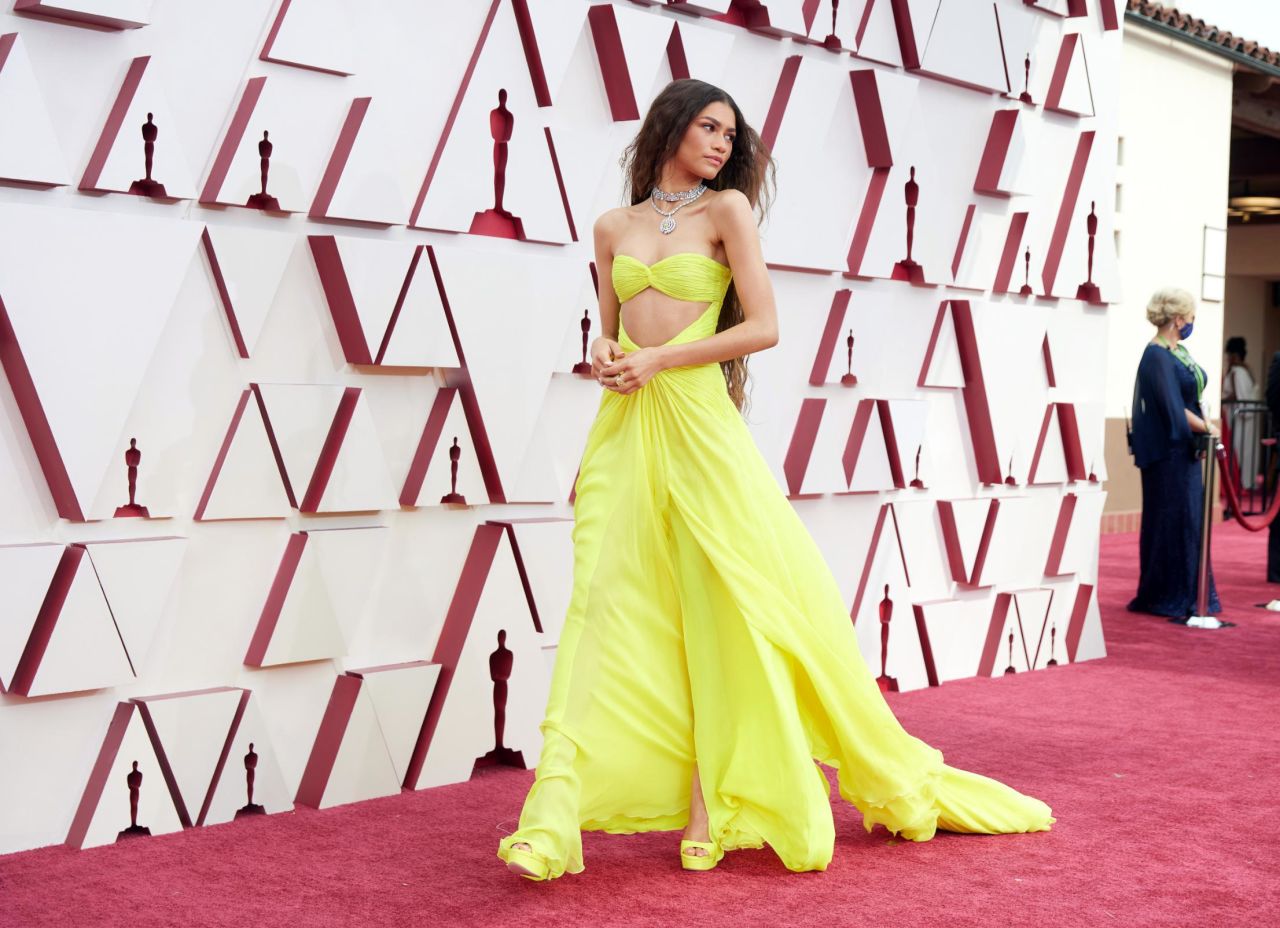 Zendaya pays tribute to Cher on Oscars red carpet in glow-in-the-dark