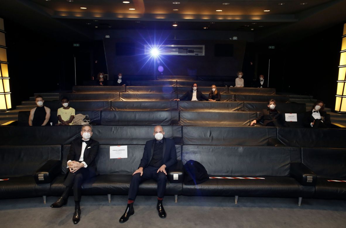 Nominees attend an Oscars screening in Paris on Sunday, April 25. Many award nominees were in Los Angeles, but some appeared remotely because of the Covid-19 pandemic.
