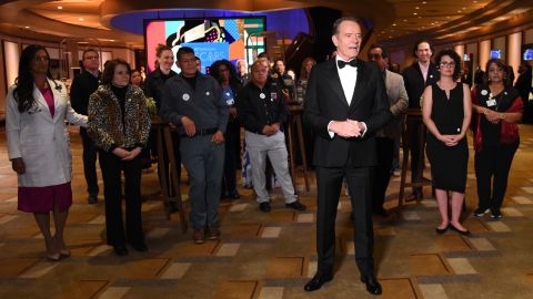 Actor Bryan Cranston recognizes some of the vaccinated front-line workers who were at the Dolby Theatre on Sunday night. Cranston was presenting the Jean Hersholt Humanitarian Award to the Motion Picture and Television Fund for the group's help and assistance to productions during the coronavirus pandemic.