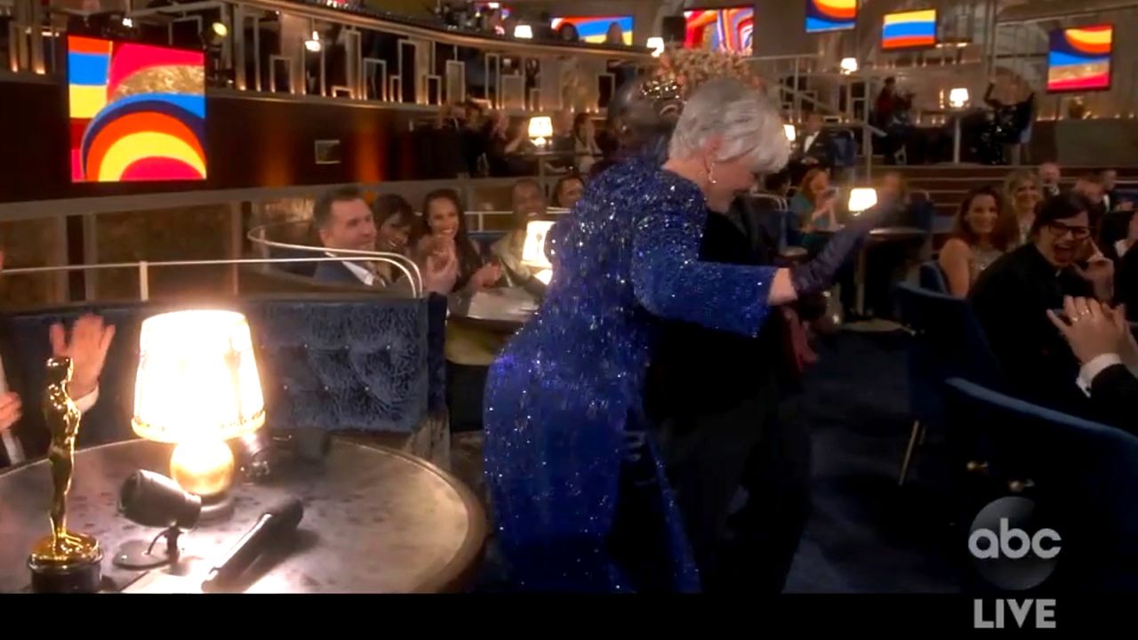 In this video image provided by ABC, Lil Rel Howery reacts as Glenn Close (foreground) dances to E.U.'s "Da Butt" at the Oscars on April 25. 